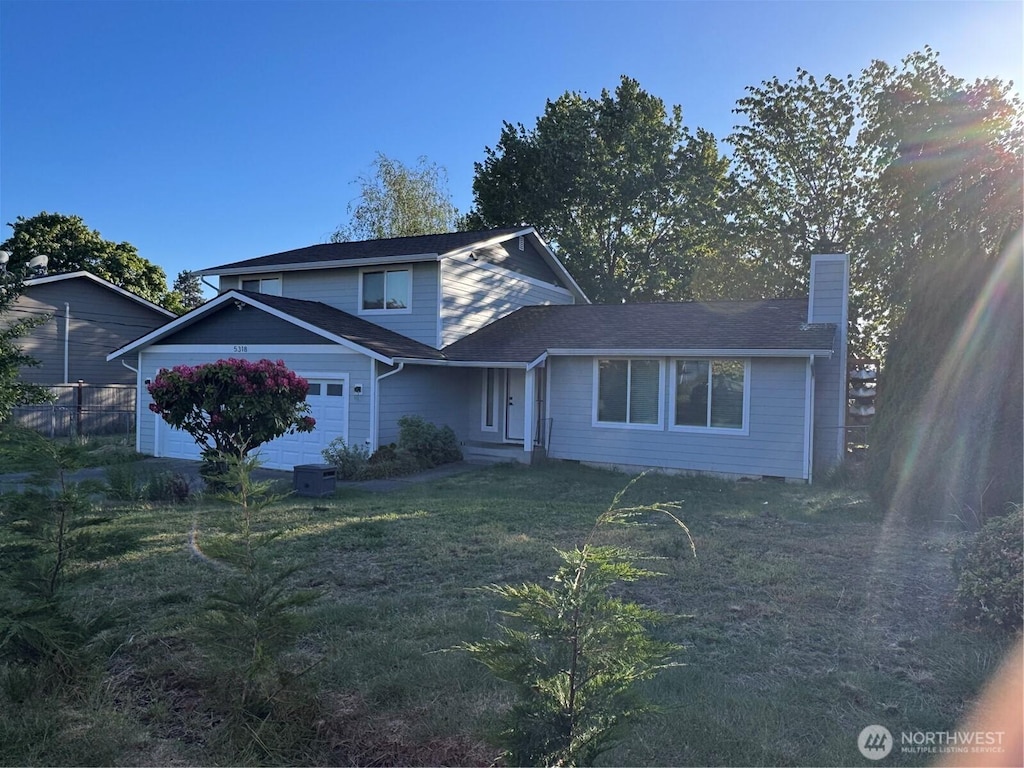 5318 Frances Ave NE, Tacoma, WA 98422 - view of front of house with a garage and a chimney