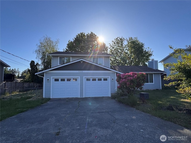 5318 Frances Ave NE, Tacoma, WA 98422 - traditional-style home with driveway, cooling unit, and a chimney