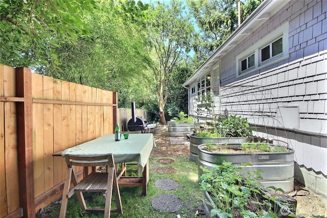 719 N 92nd St, Seattle, WA 98103 - view of yard featuring a vegetable garden