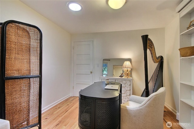 719 N 92nd St, Seattle, WA 98103 - home office featuring light wood-style floors and baseboards