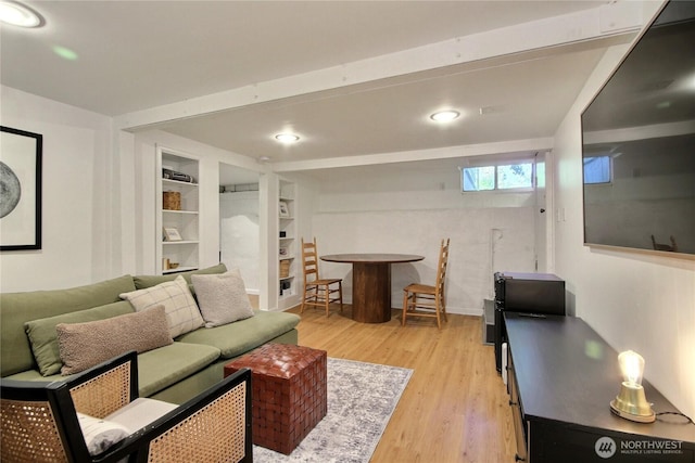 719 N 92nd St, Seattle, WA 98103 - living area featuring light wood-style floors, recessed lighting, and built in shelves