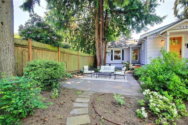 719 N 92nd St, Seattle, WA 98103 - view of yard with outdoor lounge area and a patio area