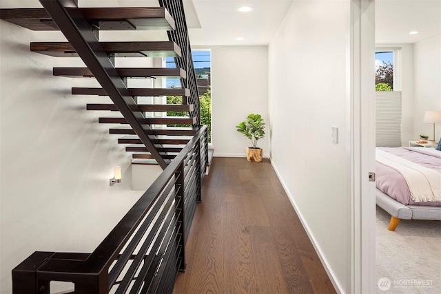 922 N 36th St, Seattle, WA 98103 - corridor featuring dark wood-style flooring, baseboards, recessed lighting, and stairway