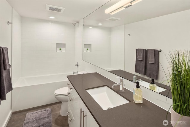 922 N 36th St, Seattle, WA 98103 - bathroom with vanity, toilet, washtub / shower combination, and recessed lighting