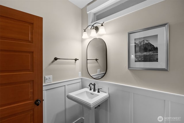 1808 153rd Street Ct NW, Gig Harbor, WA 98332 - bathroom featuring a decorative wall and wainscoting