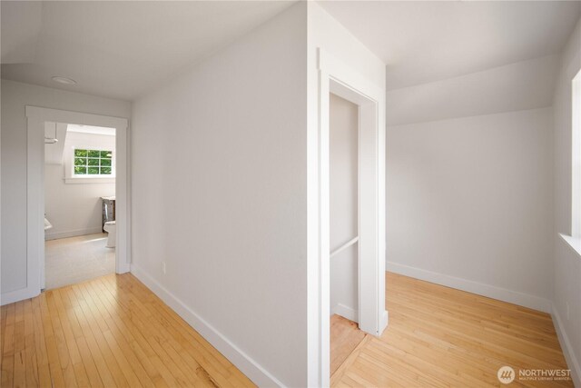 707 Ryan Ave, Sumner, WA 98390 - hallway featuring light wood-style flooring