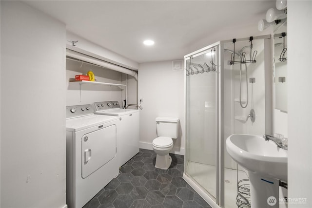 707 Ryan Ave, Sumner, WA 98390 - full bathroom featuring a stall shower, washer and clothes dryer, and tile patterned flooring