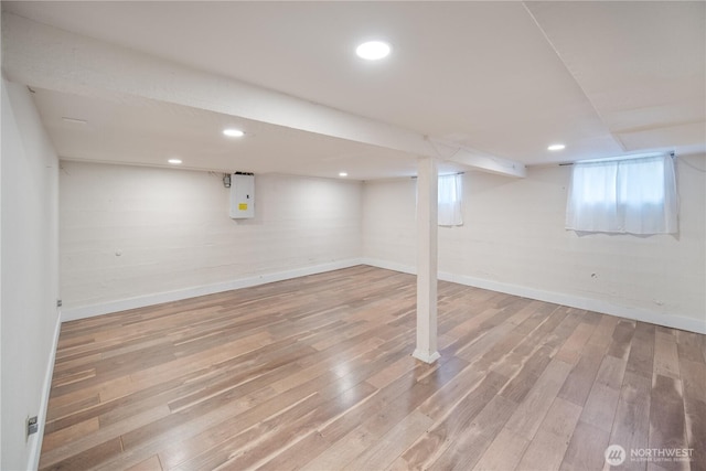 707 Ryan Ave, Sumner, WA 98390 - below grade area featuring baseboards and wood finished floors