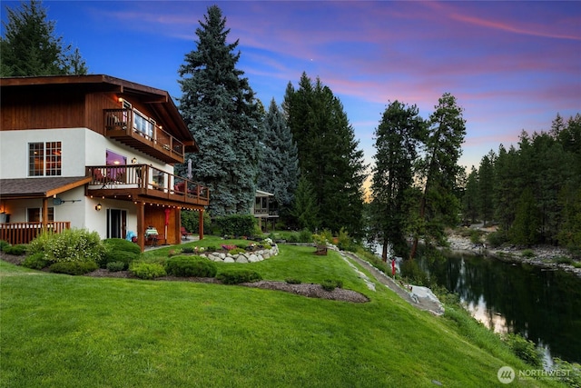 8775 Icicle Rd, Leavenworth, WA 98826 - yard at dusk featuring a yard and a deck with water view