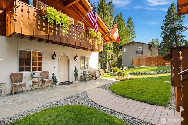 8775 Icicle Rd, Leavenworth, WA 98826 - view of yard with a balcony and a patio area