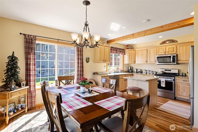 8775 Icicle Rd, Leavenworth, WA 98826 - dining area with light wood-style flooring, a chandelier, beamed ceiling, and recessed lighting