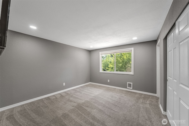2607 S 379th Pl, Federal Way, WA 98003 - unfurnished bedroom with a closet, carpet flooring, and recessed lighting