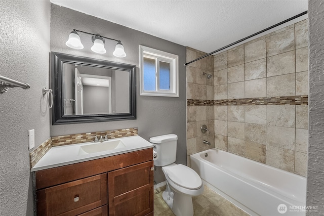2607 S 379th Pl, Federal Way, WA 98003 - full bath with a textured wall, vanity, tub / shower combination, and a textured ceiling