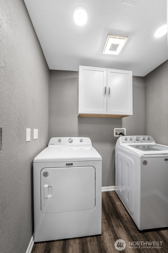 2607 S 379th Pl, Federal Way, WA 98003 - laundry room with cabinet space, independent washer and dryer, dark wood-type flooring, and a textured wall