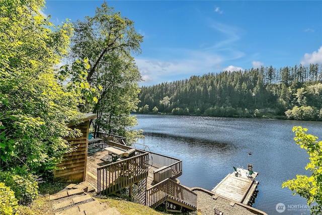 39424 Skipark Rd E, Eatonville, WA 98328 - dock area with a wooded view and a deck with water view