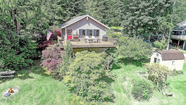 881 Lawson Rd, Camano Island, WA 98282 - view of front facade featuring a deck and a front lawn