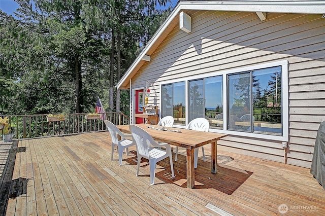 881 Lawson Rd, Camano Island, WA 98282 - wooden terrace with outdoor dining space