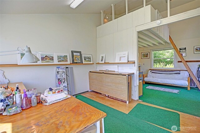 881 Lawson Rd, Camano Island, WA 98282 - game room with wood finished floors and vaulted ceiling