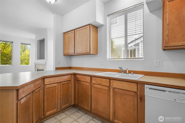 2546 Mitchell Ave Unit 2, Dupont, WA 98327 - kitchen featuring white dishwasher, light countertops, and a peninsula