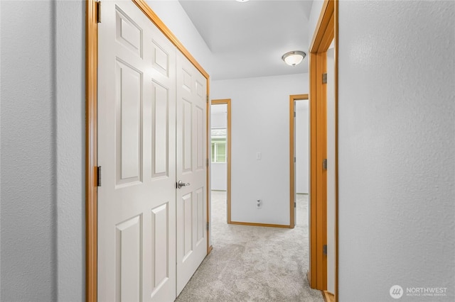 2546 Mitchell Ave Unit 2, Dupont, WA 98327 - hallway featuring carpet and baseboards