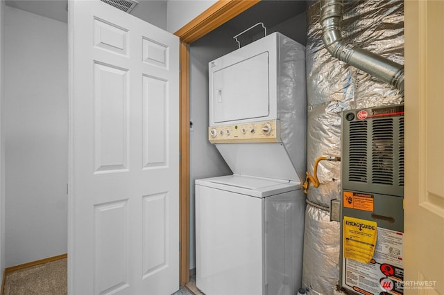 2546 Mitchell Ave Unit 2, Dupont, WA 98327 - washroom with stacked washer / dryer