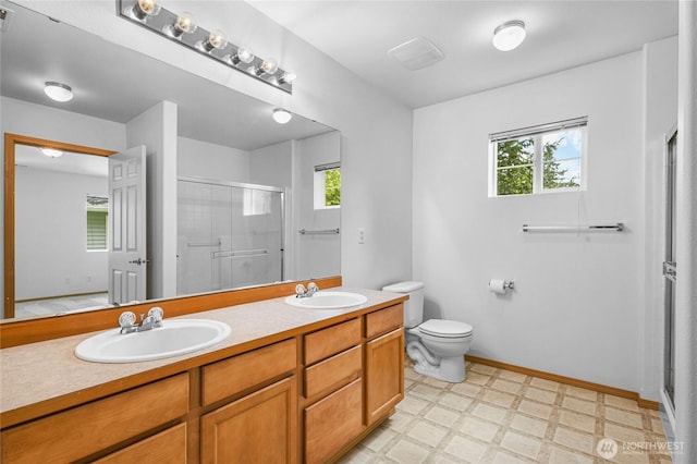 2546 Mitchell Ave Unit 2, Dupont, WA 98327 - full bathroom featuring a stall shower, tile patterned floors, and double vanity