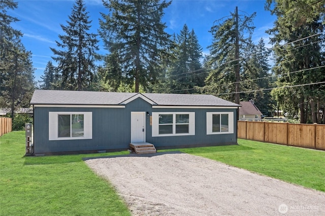 17101 Snowbell Ct SE, Yelm, WA 98597 - view of front of house with driveway, crawl space, and a shingled roof