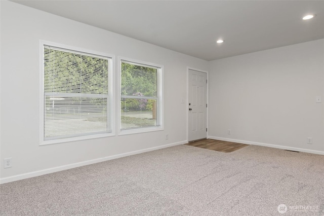 17101 Snowbell Ct SE, Yelm, WA 98597 - carpeted empty room featuring baseboards and recessed lighting