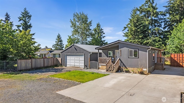 22106 Cedarview Dr E, Bonney Lake, WA 98391 - view of front of property featuring driveway and a garage