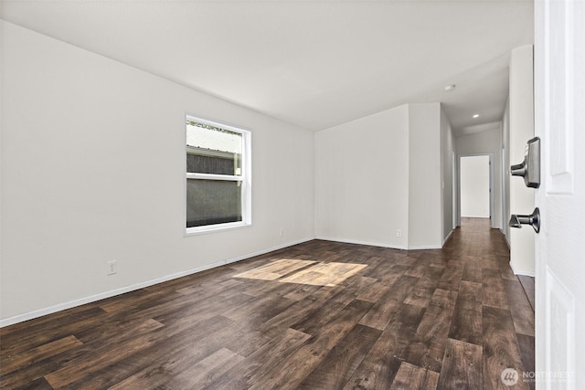22106 Cedarview Dr E, Bonney Lake, WA 98391 - spare room featuring dark wood finished floors, baseboards, and recessed lighting