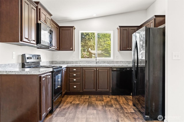22106 Cedarview Dr E, Bonney Lake, WA 98391 - kitchen with black appliances, a sink, lofted ceiling, dark wood-style flooring, and dark brown cabinets