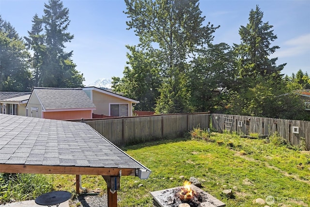22106 Cedarview Dr E, Bonney Lake, WA 98391 - view of yard with a fire pit