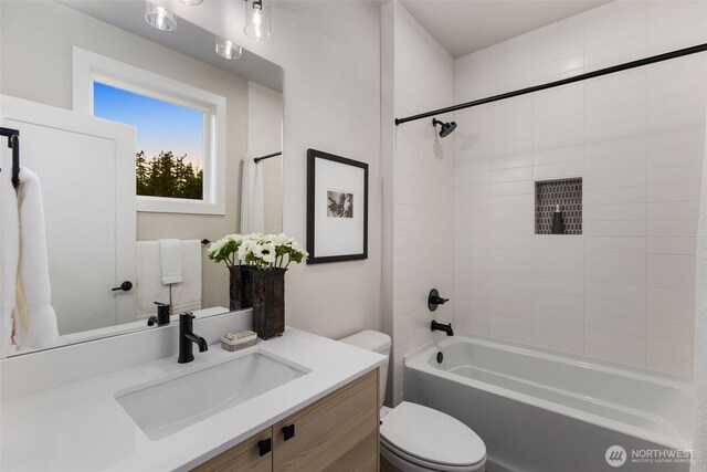 1201 222nd Ct SE, Sammamish, WA 98075 - bathroom featuring toilet, vanity, and shower / tub combo