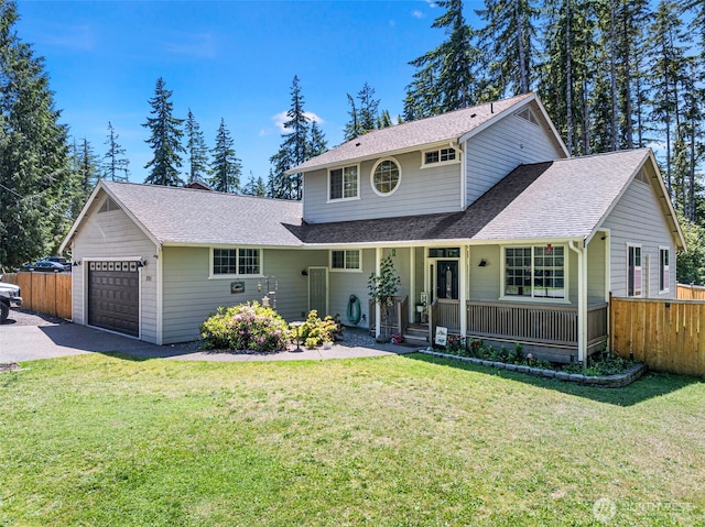 201 E Park Loop, Shelton, WA 98584 - traditional-style house with a porch, asphalt driveway, roof with shingles, and an attached garage