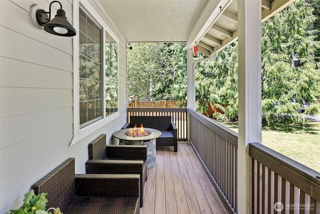 201 E Park Loop, Shelton, WA 98584 - wooden deck with an outdoor fire pit and view of scattered trees