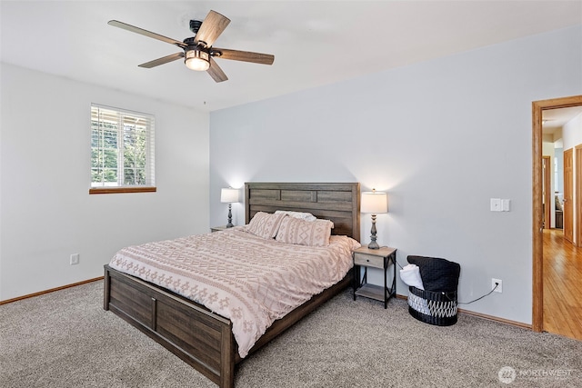 201 E Park Loop, Shelton, WA 98584 - bedroom with light colored carpet, baseboards, and a ceiling fan