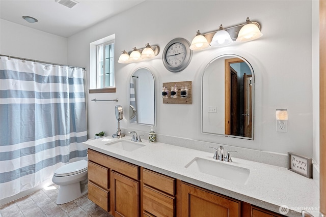 201 E Park Loop, Shelton, WA 98584 - full bath with toilet, double vanity, and curtained shower