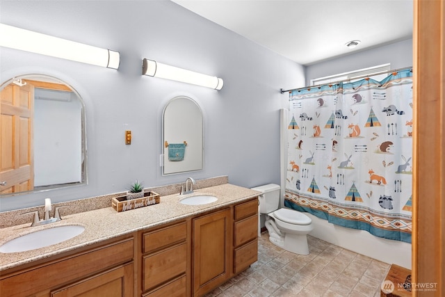 201 E Park Loop, Shelton, WA 98584 - full bathroom with toilet, double vanity, and shower / bath combo with shower curtain