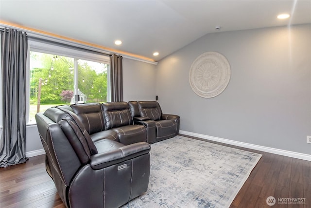 14918 Champion Estates Dr SE, Yelm, WA 98597 - living room featuring lofted ceiling, dark wood-style flooring, and recessed lighting