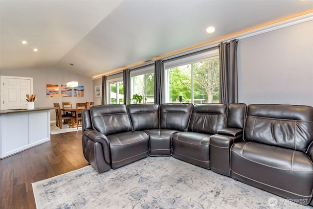 14918 Champion Estates Dr SE, Yelm, WA 98597 - living room featuring vaulted ceiling, wood finished floors, and recessed lighting