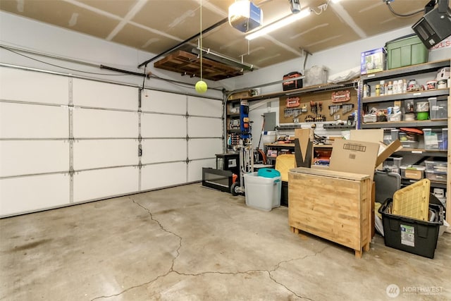 14918 Champion Estates Dr SE, Yelm, WA 98597 - garage featuring a garage door opener