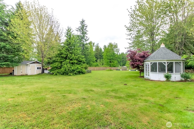 14918 Champion Estates Dr SE, Yelm, WA 98597 - view of yard featuring a storage shed and view of scattered trees