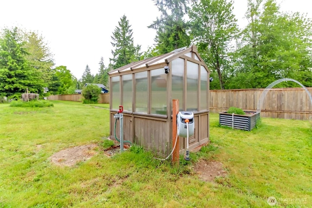 14918 Champion Estates Dr SE, Yelm, WA 98597 - view of greenhouse with a fenced backyard and a garden