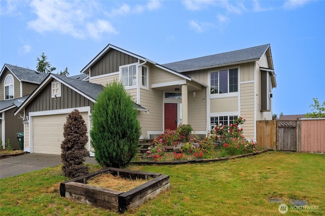 1105 200th Street Ct E, Spanaway, WA 98387 - view of front facade with board and batten siding, asphalt driveway, an attached garage, and roof with shingles