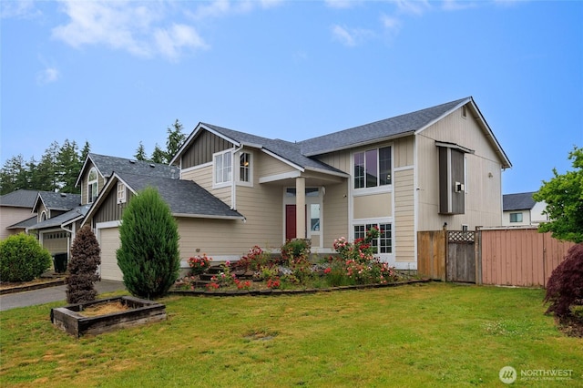1105 200th Street Ct E, Spanaway, WA 98387 - view of front of home featuring an attached garage, board and batten siding, and roof with shingles