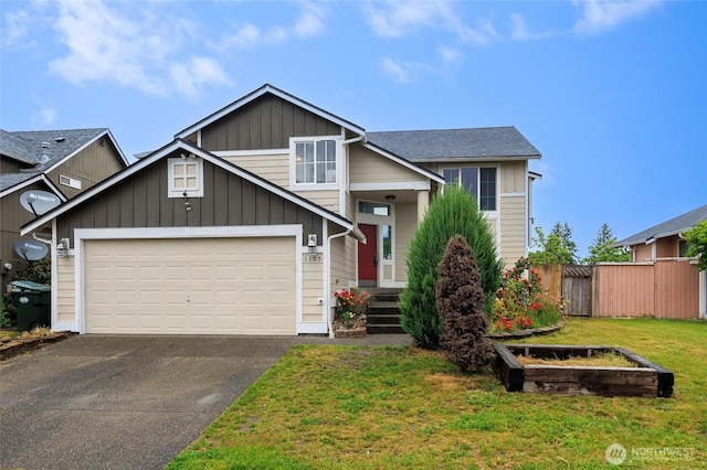 1105 200th Street Ct E, Spanaway, WA 98387 - view of front of property with asphalt driveway and an attached garage