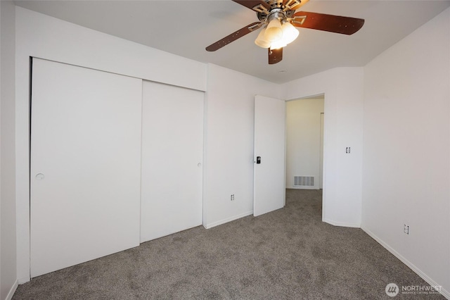 1105 200th Street Ct E, Spanaway, WA 98387 - unfurnished bedroom with carpet, a closet, ceiling fan, and baseboards
