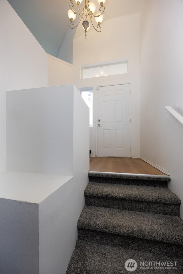 1105 200th Street Ct E, Spanaway, WA 98387 - staircase featuring a chandelier