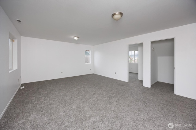 1105 200th Street Ct E, Spanaway, WA 98387 - unfurnished room with dark carpet and baseboards