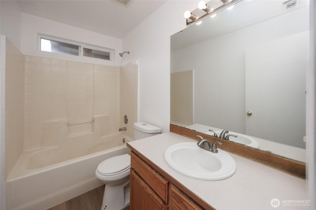1105 200th Street Ct E, Spanaway, WA 98387 - bathroom with vanity, toilet, shower / bath combination, and wood finished floors